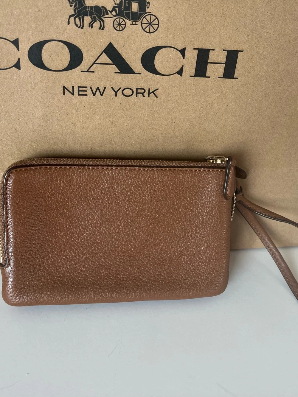 Coach Pebbled Leather Wristlet in Chestnut Brown